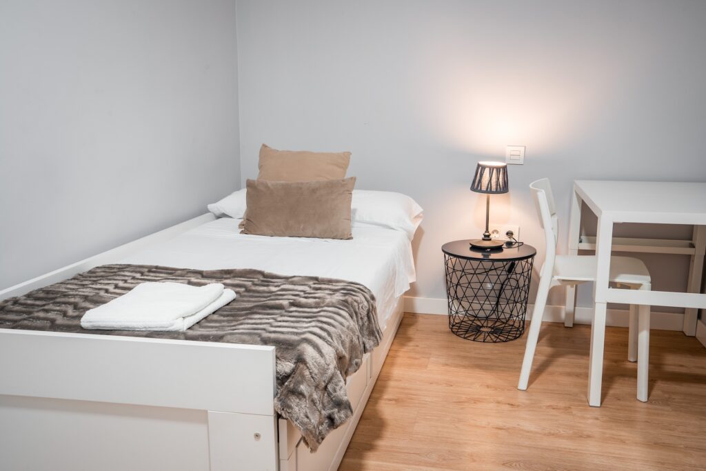 Dormitorio de Apartamento Turístico Quality Homes Estación de tren en Granada